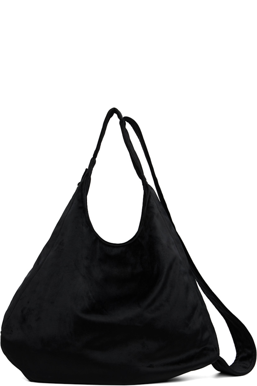 Velvet messenger bag.

· Fixed shoulder strap and crossbody strap
· D-ring at side
· Press-stud closure
· Welt pocket at interior
· Satin lining
· H18" x W20" x D4"

Supplier color: Black