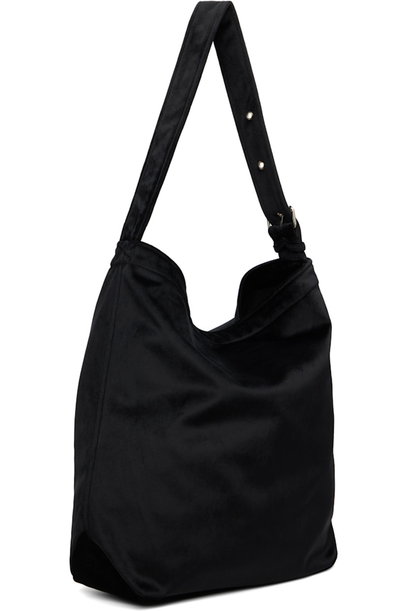 Velvet tote.

· Adjustable shoulder strap
· Fleece lining
· H16" x W16" x D4.5"

Supplier color: Black