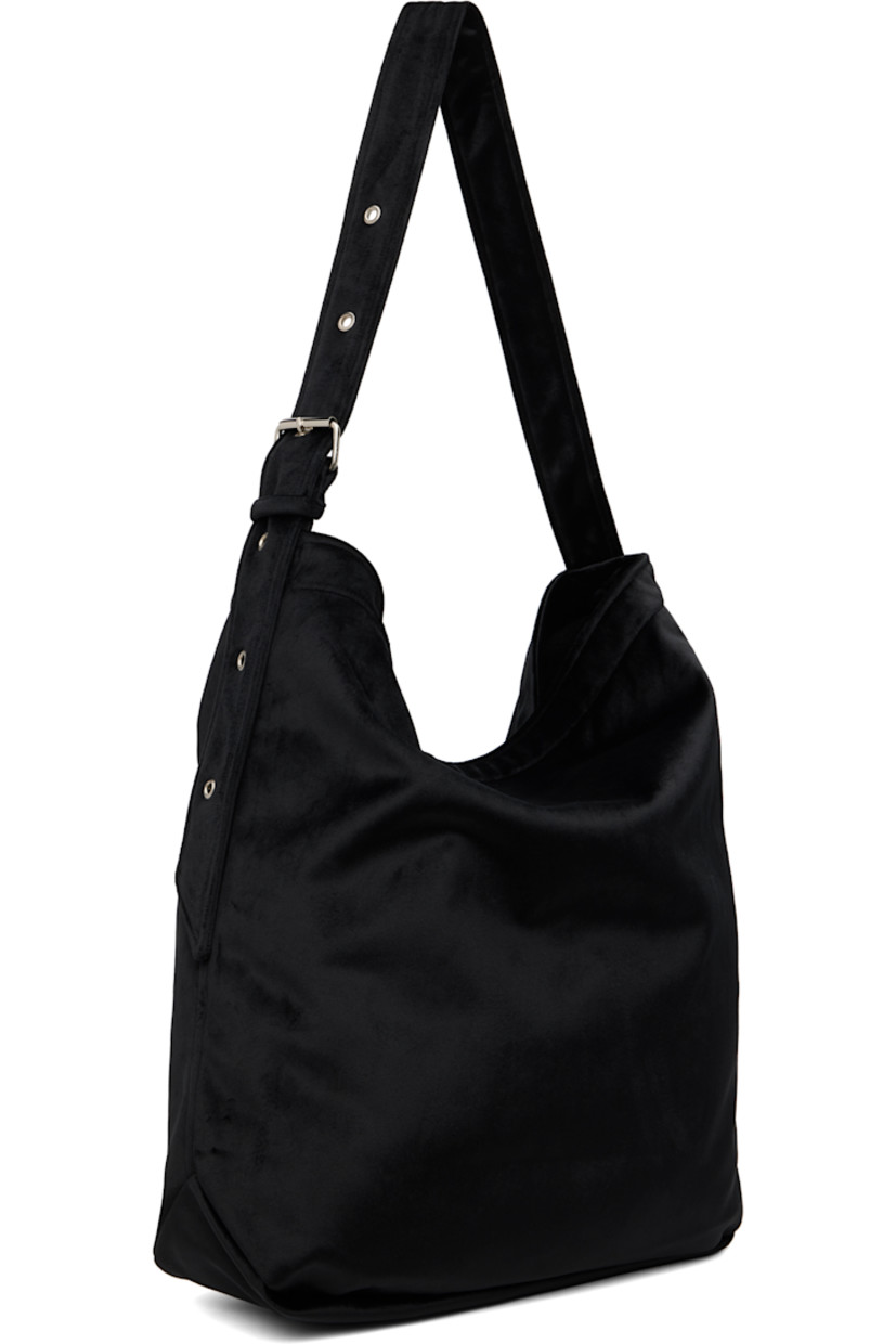 Velvet tote.

· Adjustable shoulder strap
· Fleece lining
· H16" x W16" x D4.5"

Supplier color: Black