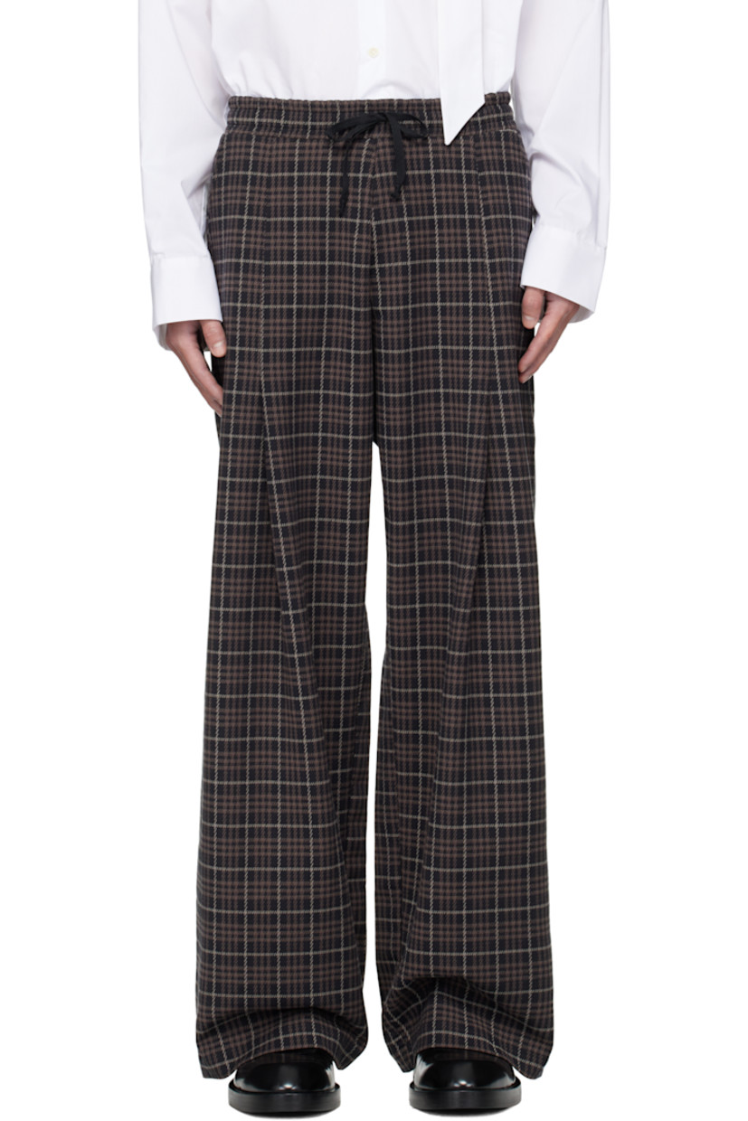 Plain-woven stretch cotton-blend trousers.

· Loose-fit and straight-leg 
· Houndstooth pattern throughout 
· Drawstring at elasticized waistband 
· Two-pocket styling
· Concealed zip fly 

Available exclusively at SSENSE.

Supplier color: Multicolor check