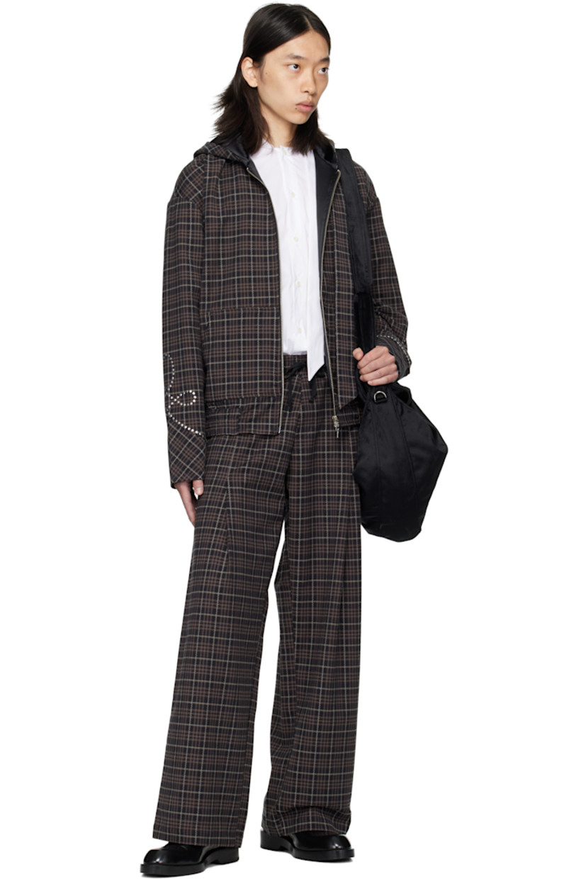 Plain-woven stretch cotton-blend jacket. 

· Houndstooth pattern and rivets throughout 
· Extending trim at collar 
· Two-way zip closure
· Patch pockets at waist
· Elasticized hem 

Available exclusively at SSENSE.

Supplier color: Multicolor check