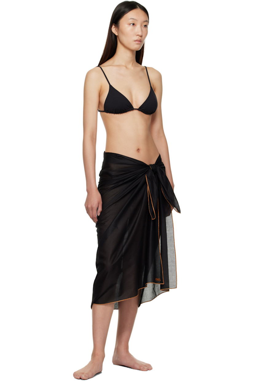 Semi-sheer cotton voile cover-up.
 
· Wrap construction
· Metallic thread detailing at edges
· Logo bonded at hem

Supplier color: Noir