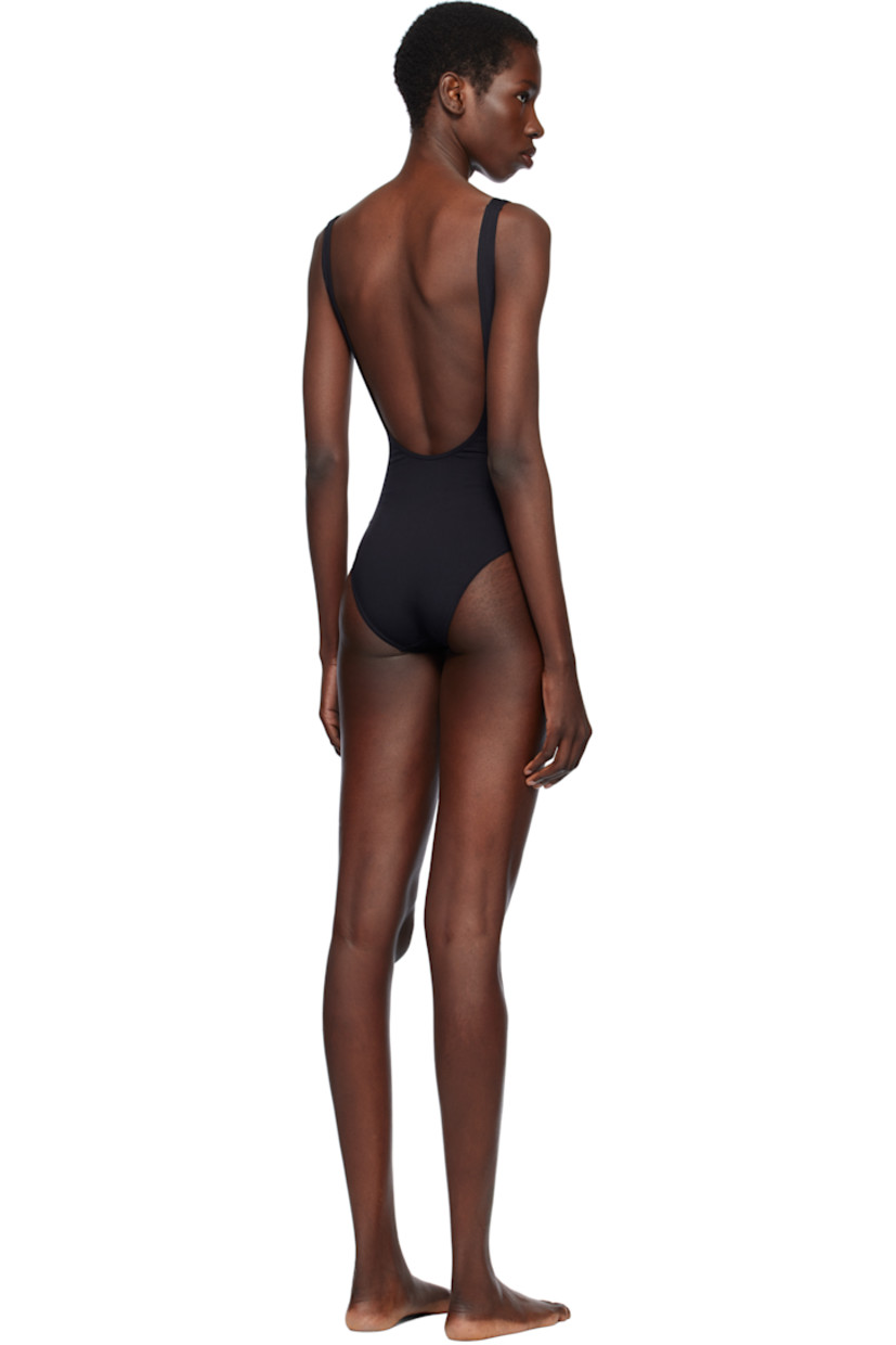Stretch nylon jersey one-piece swimsuit.

· Plunging V-neck
· Wraparound self-tie straps with beading
· Fixed straps
· Low back
· Partially lined

Supplier color: Noir
