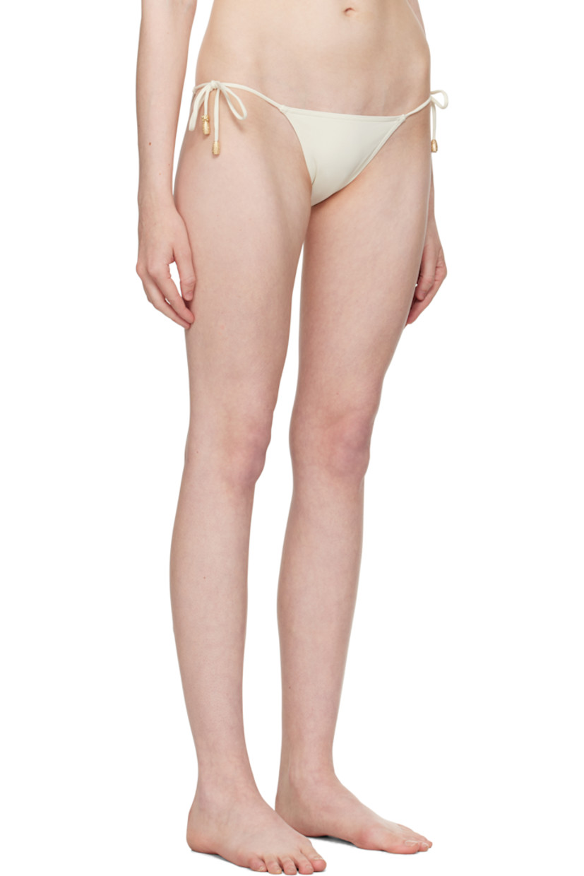 Stretch nylon jersey bikini bottom. 

· Self-tie fastening at sides
· Textured graphic hardware at straps
· Partial jersey lining
· Gold-tone hardware 

Supplier color: Sable fin