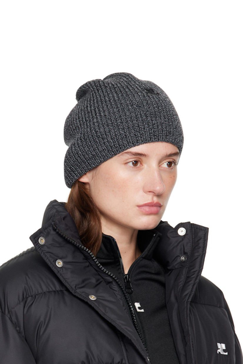 Rib-knit merino wool beanie. Embroidered logo patch at face.

Supplier color: Black/Grey