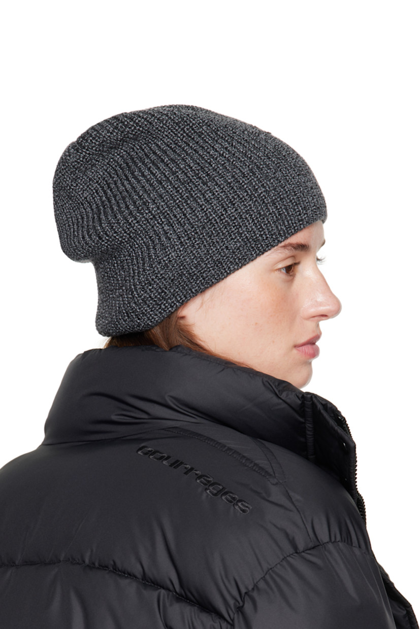 Rib-knit merino wool beanie. Embroidered logo patch at face.

Supplier color: Black/Grey
