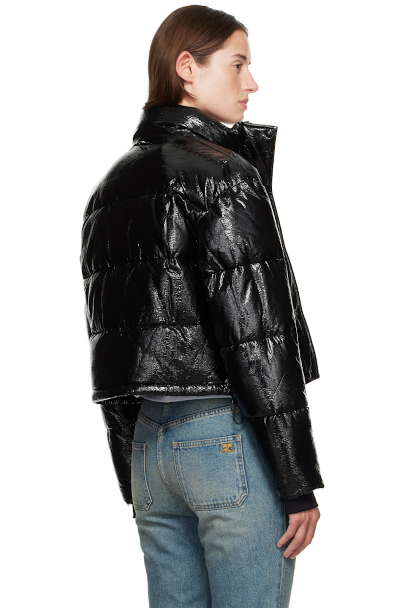 Insulated and quilted stretch vinyl jacket.

· Stand collar
· Two-way zip closure with press-stud placket
· Zip pockets at front
· Bungee-style drawstring at cropped hem
· Logo flag at side seam
· Thumbhole at inset jersey cuffs
· Logo-engraved D-ring at back collar
· Zip pocket at interior
· Full satin lining

Supplier color: Black