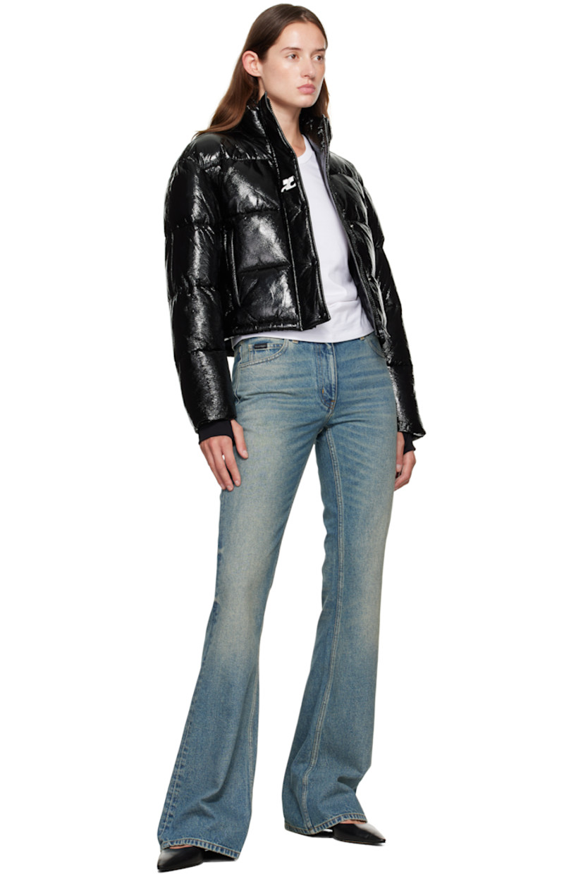 Insulated and quilted stretch vinyl jacket.

· Stand collar
· Two-way zip closure with press-stud placket
· Zip pockets at front
· Bungee-style drawstring at cropped hem
· Logo flag at side seam
· Thumbhole at inset jersey cuffs
· Logo-engraved D-ring at back collar
· Zip pocket at interior
· Full satin lining

Supplier color: Black