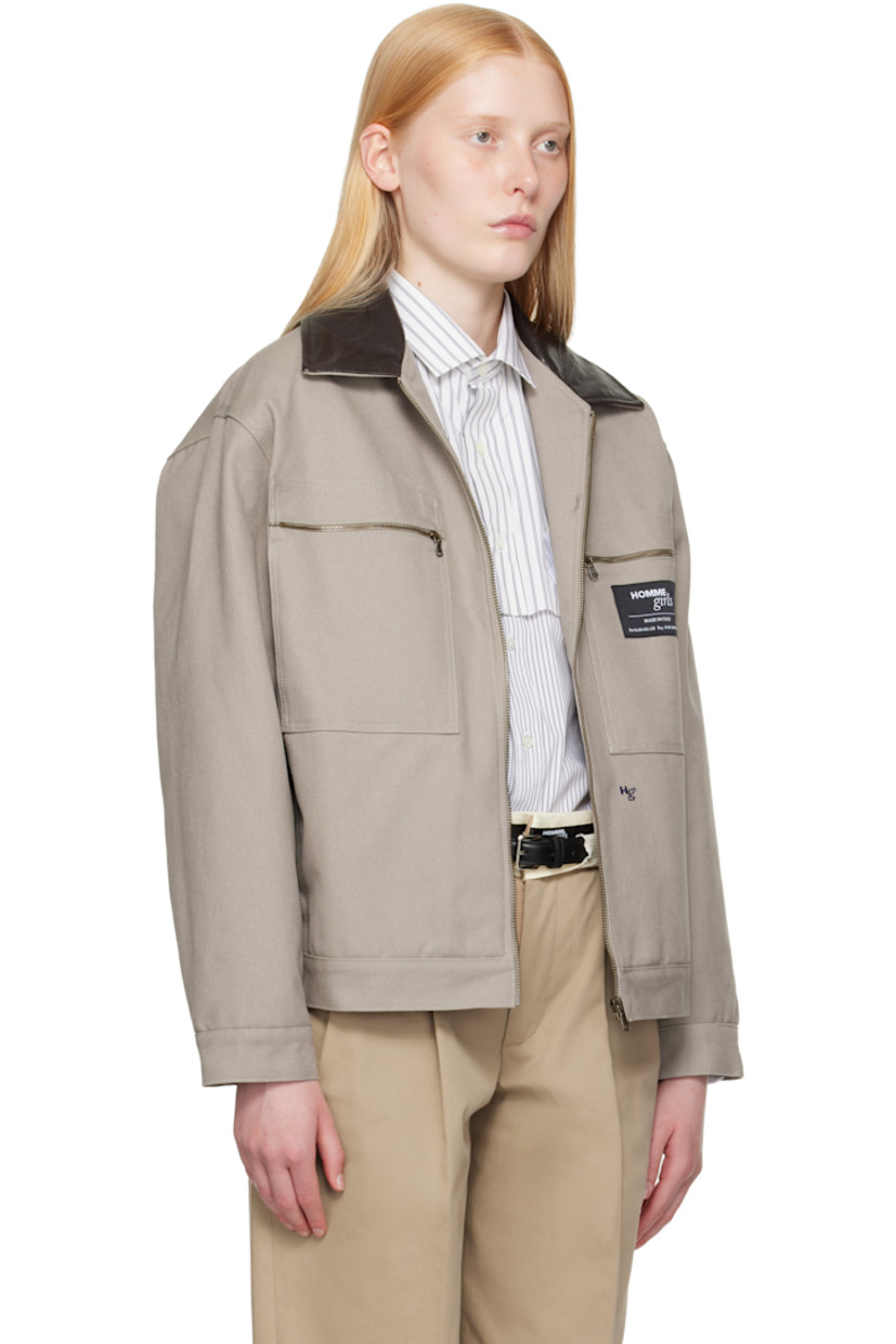 Padded cotton canvas jacket. 

· Grained lambskin spread collar
· Zip closure
· Zip pockets and welt pockets
· Logo patch at chest
· Logo embroidered at front
· Buttoned barrel cuffs
· Full satin lining
· Logo-engraved antiqued brass-tone hardware

Supplier color: Grey canvas