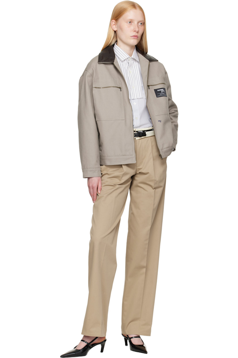 Padded cotton canvas jacket. 

· Grained lambskin spread collar
· Zip closure
· Zip pockets and welt pockets
· Logo patch at chest
· Logo embroidered at front
· Buttoned barrel cuffs
· Full satin lining
· Logo-engraved antiqued brass-tone hardware

Supplier color: Grey canvas