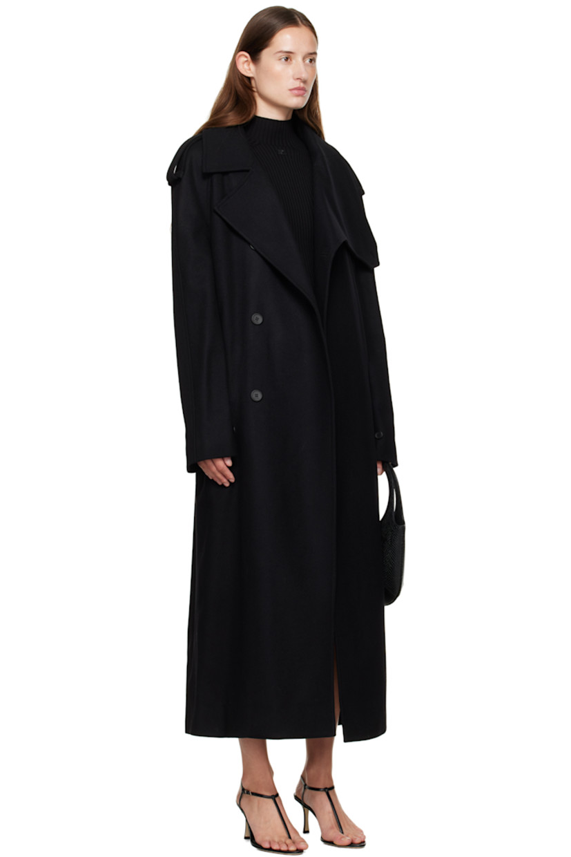 Wool-blend melton trench coat.

· Modified notched lapel
· Double-breasted button closure
· Welt pockets at waist
· Integrated button belt
· Epaulets
· Raglan sleeves
· Zip vent and button tab at cuffs
· Storm flap at back
· Central vent at back hem
· Welt pocket at interior
· Full satin lining

Supplier color: Black