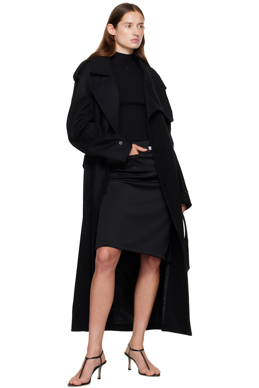 Wool-blend melton trench coat.

· Modified notched lapel
· Double-breasted button closure
· Welt pockets at waist
· Integrated button belt
· Epaulets
· Raglan sleeves
· Zip vent and button tab at cuffs
· Storm flap at back
· Central vent at back hem
· Welt pocket at interior
· Full satin lining

Supplier color: Black