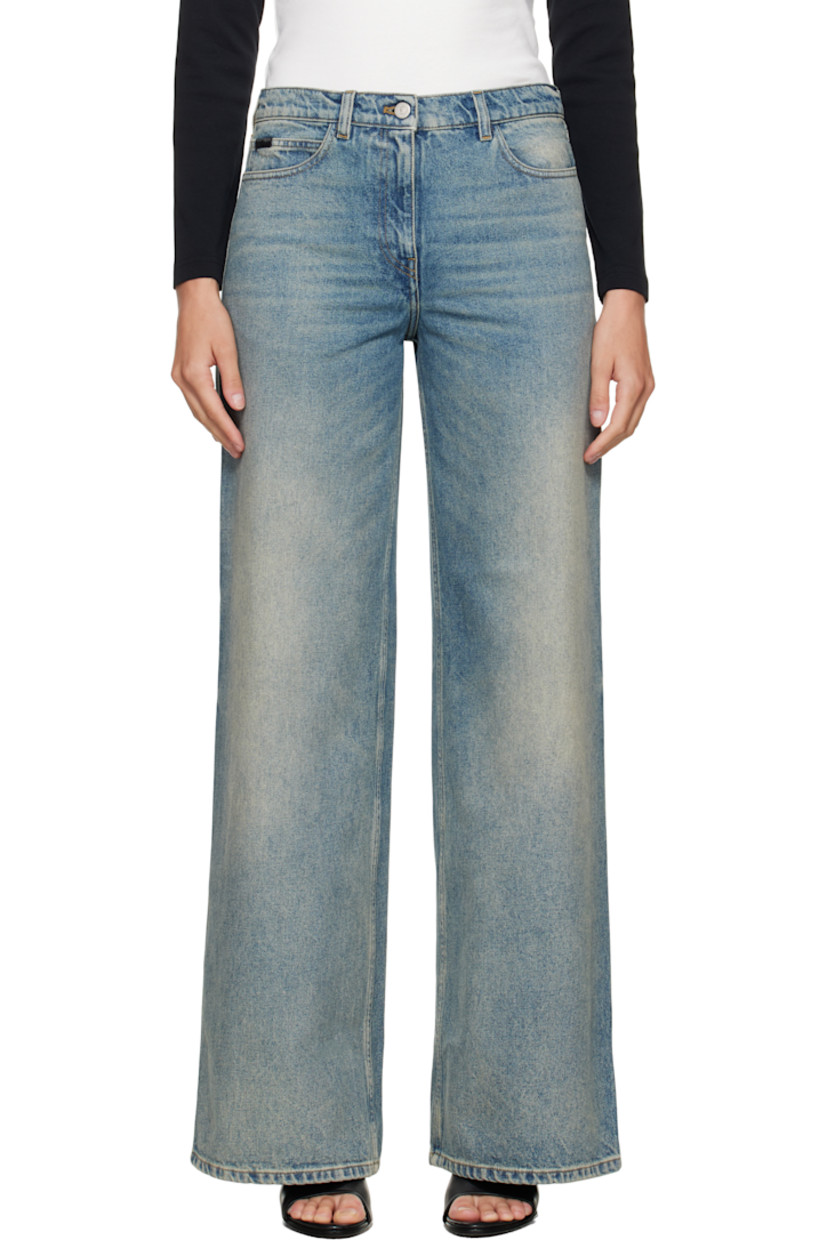 Non-stretch denim jeans.

· Fading and whiskering throughout
· Loose-fit
· Belt loops
· Five-pocket styling
· Zip fly
· Logo patch at coin pocket
· Logo embroidered at back pocket
· Hammer loop and welt pocket at back leg
· Contrast stitching in tan

Supplier color: Vintage medium blue