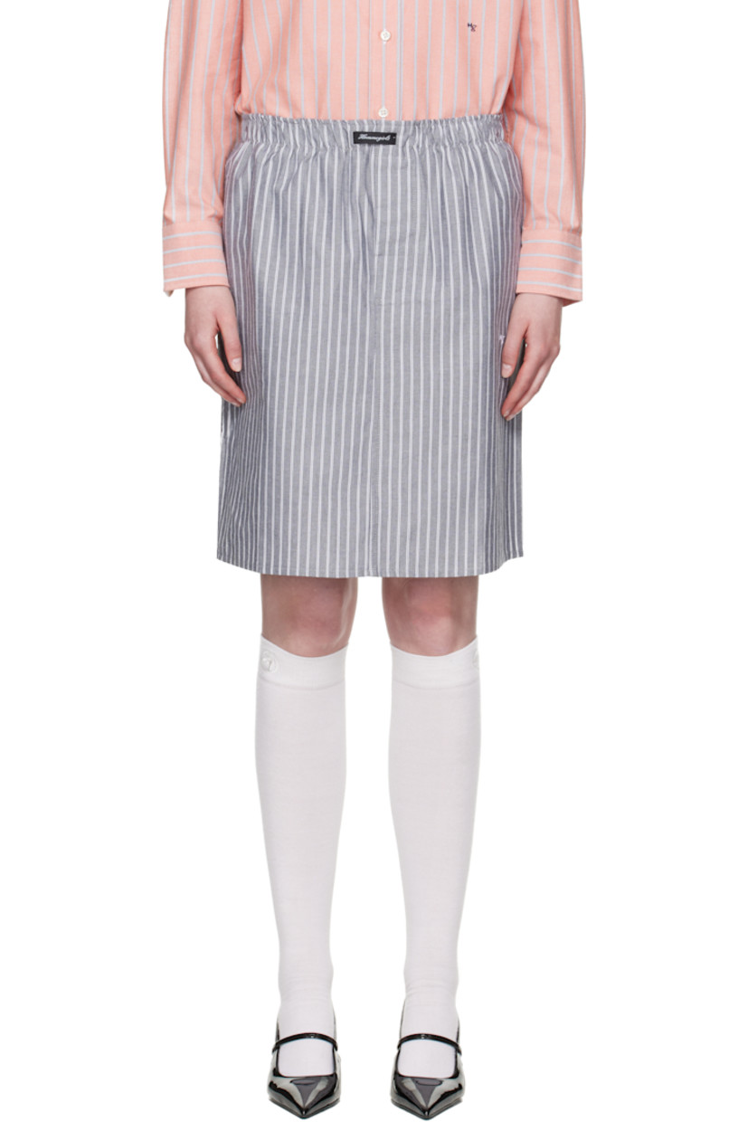 Cotton oxford cloth midi skirt. Stripes throughout.

· Logo patch at elasticized waistband
· Button fly
· Logo embroidered at front

Supplier color: Black stripe oxford