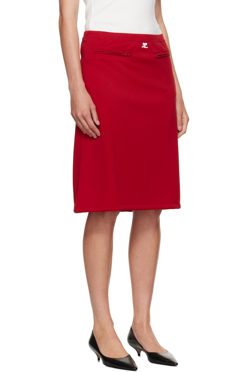 Interlock jersey midi skirt.

· Elasticized waistband
· Embroidered logo patch at front waist
· Two-pocket styling
· Darts at back waist

Supplier color: Ruby