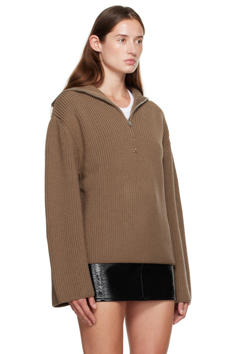 Rib-knit merino wool sweater.

· Funnel neck
· Half-zip closure
· Logo embroidered at chest
· Dropped shoulders

Supplier color: Mocha