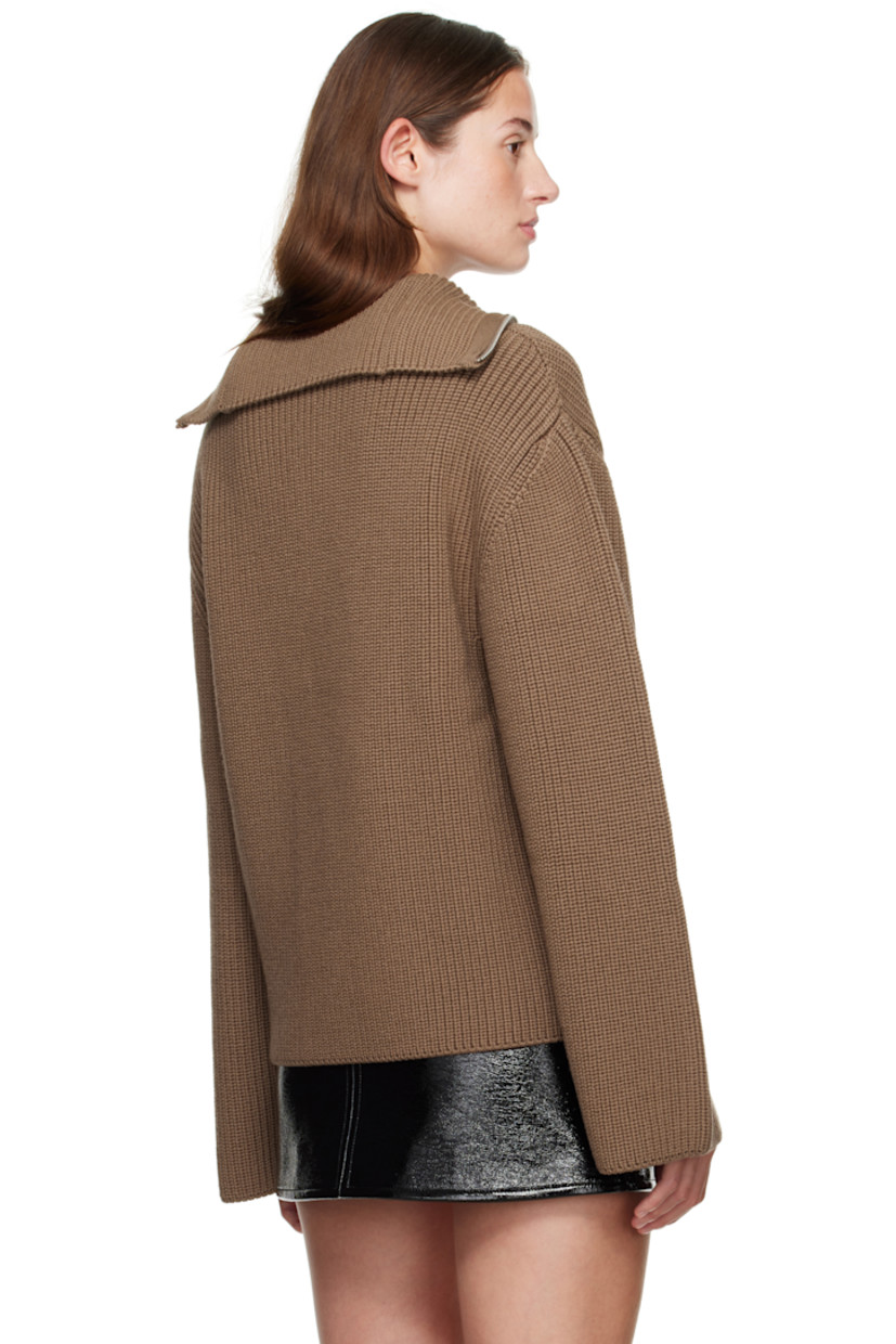 Rib-knit merino wool sweater.

· Funnel neck
· Half-zip closure
· Logo embroidered at chest
· Dropped shoulders

Supplier color: Mocha