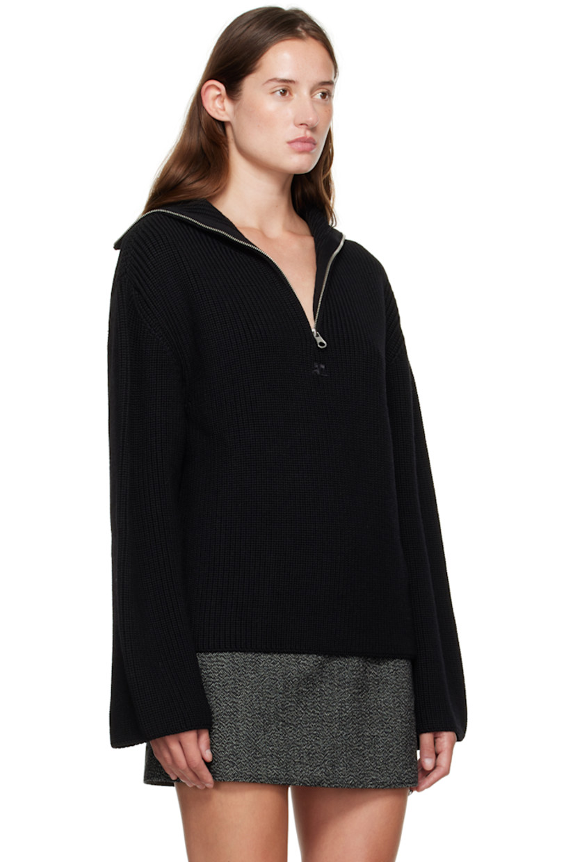 Rib-knit merino wool sweater.

· Funnel neck
· Half-zip closure
· Logo embroidered at chest
· Dropped shoulders

Supplier color: Black