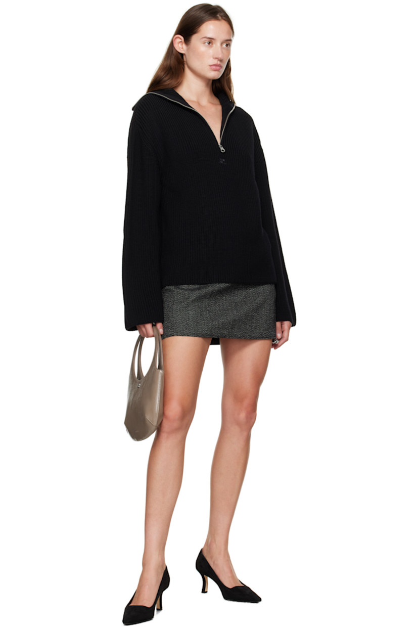 Rib-knit merino wool sweater.

· Funnel neck
· Half-zip closure
· Logo embroidered at chest
· Dropped shoulders

Supplier color: Black