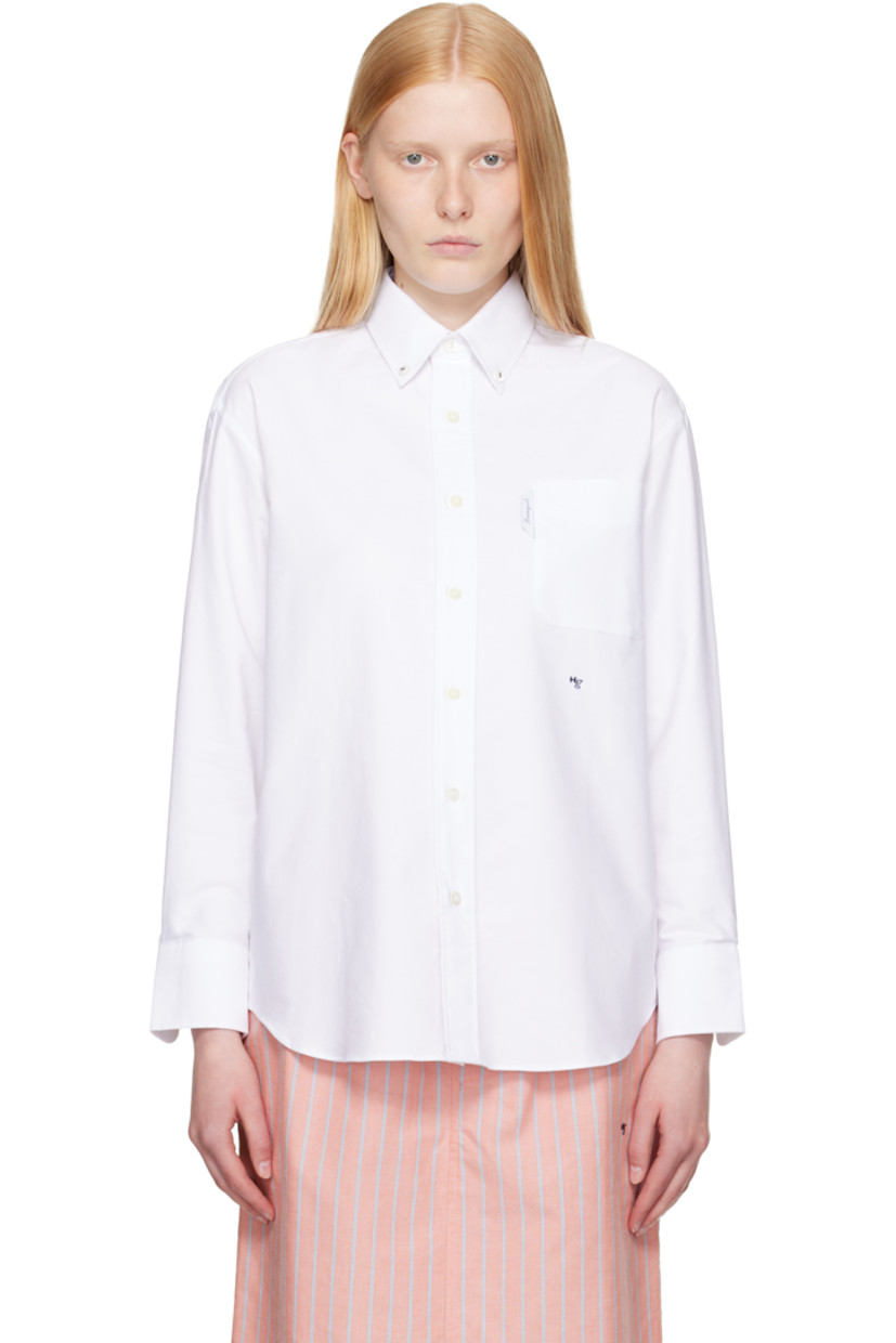 Cotton oxford cloth shirt. 

· Spread collar
· Button closure
· Logo flag and patch pocket at chest
· Logo embroidered at front
· Shirttail hem
· Adjustable buttoned barrel cuffs
· Button fastening at back collar
· Twin pleats at back yoke
· Logo-engraved mother-of-pearl hardware

Supplier color: White oxford
