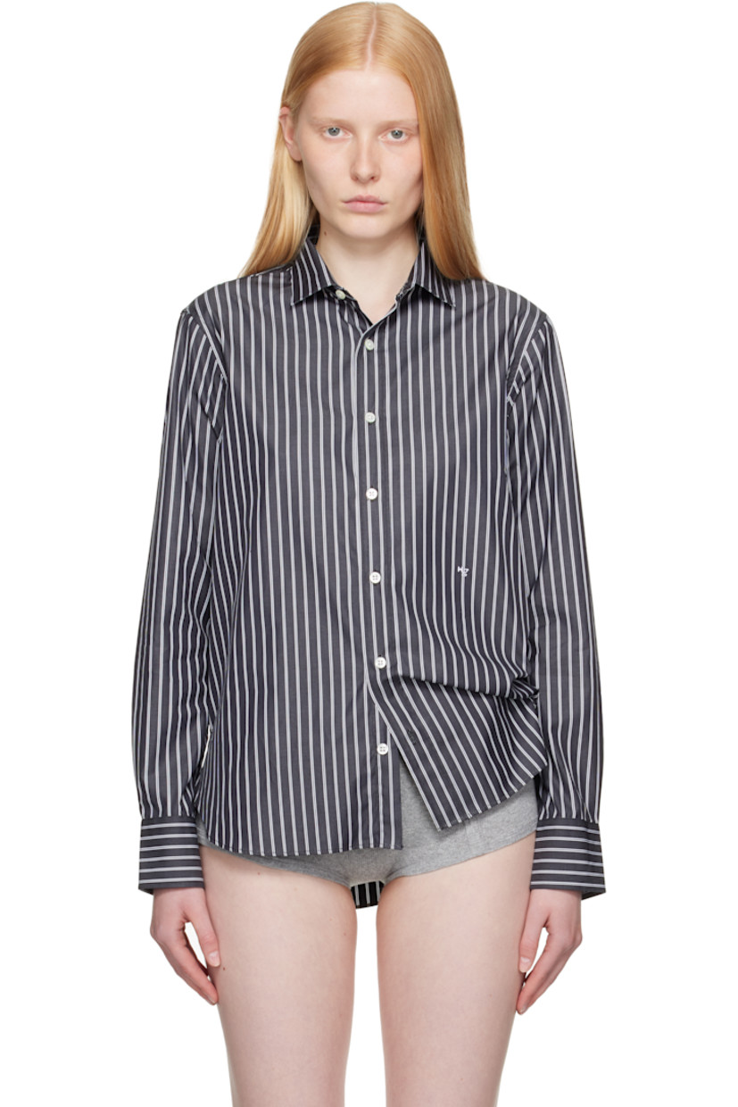 Cotton poplin shirt. Stripes throughout. 

· Spread collar
· Button closure
· Logo embroidered at front
· Shirttail hem
· Adjustable buttoned barrel cuffs
· Box pleat at back yoke
· Logo-engraved mother-of-pearl hardware

Supplier color: Black stripe