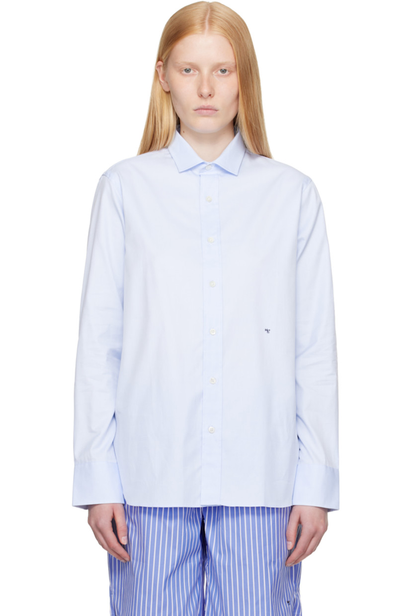 Cotton chambray shirt.

· Spread collar
· Button closure
· Logo embroidered at front
· Shirttail hem
· Adjustable buttoned barrel cuffs
· Box pleat at back yoke
· Logo-engraved mother-of-pearl hardware

Supplier color: Chambray blue