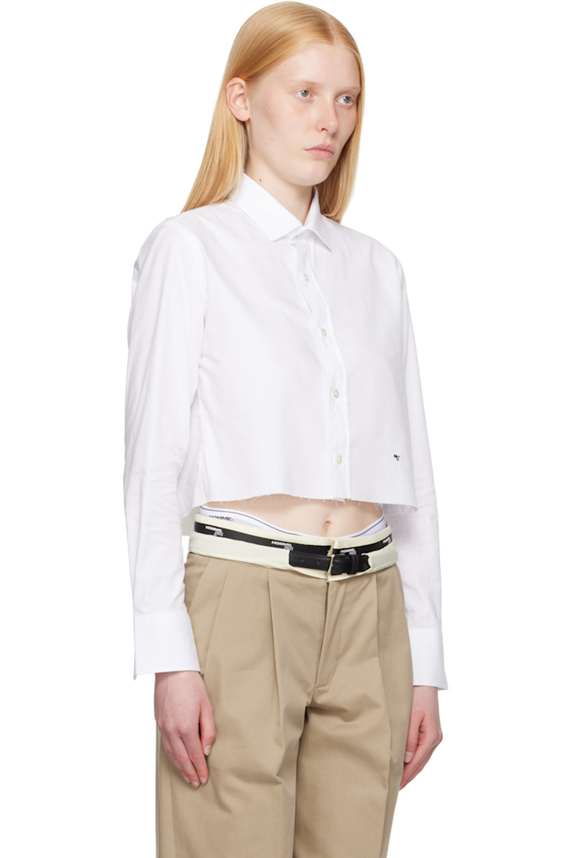 Cotton poplin shirt.

· Spread collar
· Button closure
· Logo embroidered at front
· Raw edge at cropped hem
· Adjustable buttoned barrel cuffs
· Box pleat at back yoke
· Logo-engraved mother-of-pearl hardware

Supplier color: White