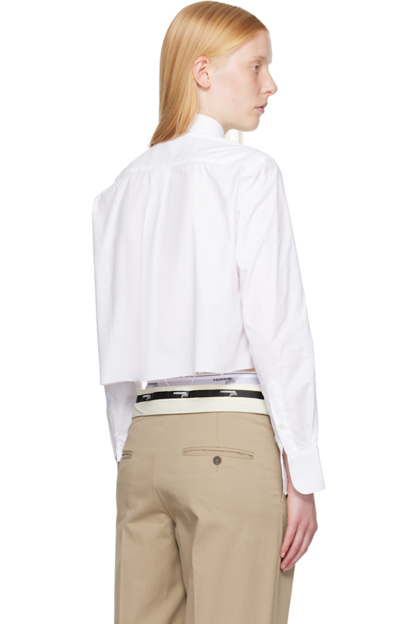 Cotton poplin shirt.

· Spread collar
· Button closure
· Logo embroidered at front
· Raw edge at cropped hem
· Adjustable buttoned barrel cuffs
· Box pleat at back yoke
· Logo-engraved mother-of-pearl hardware

Supplier color: White