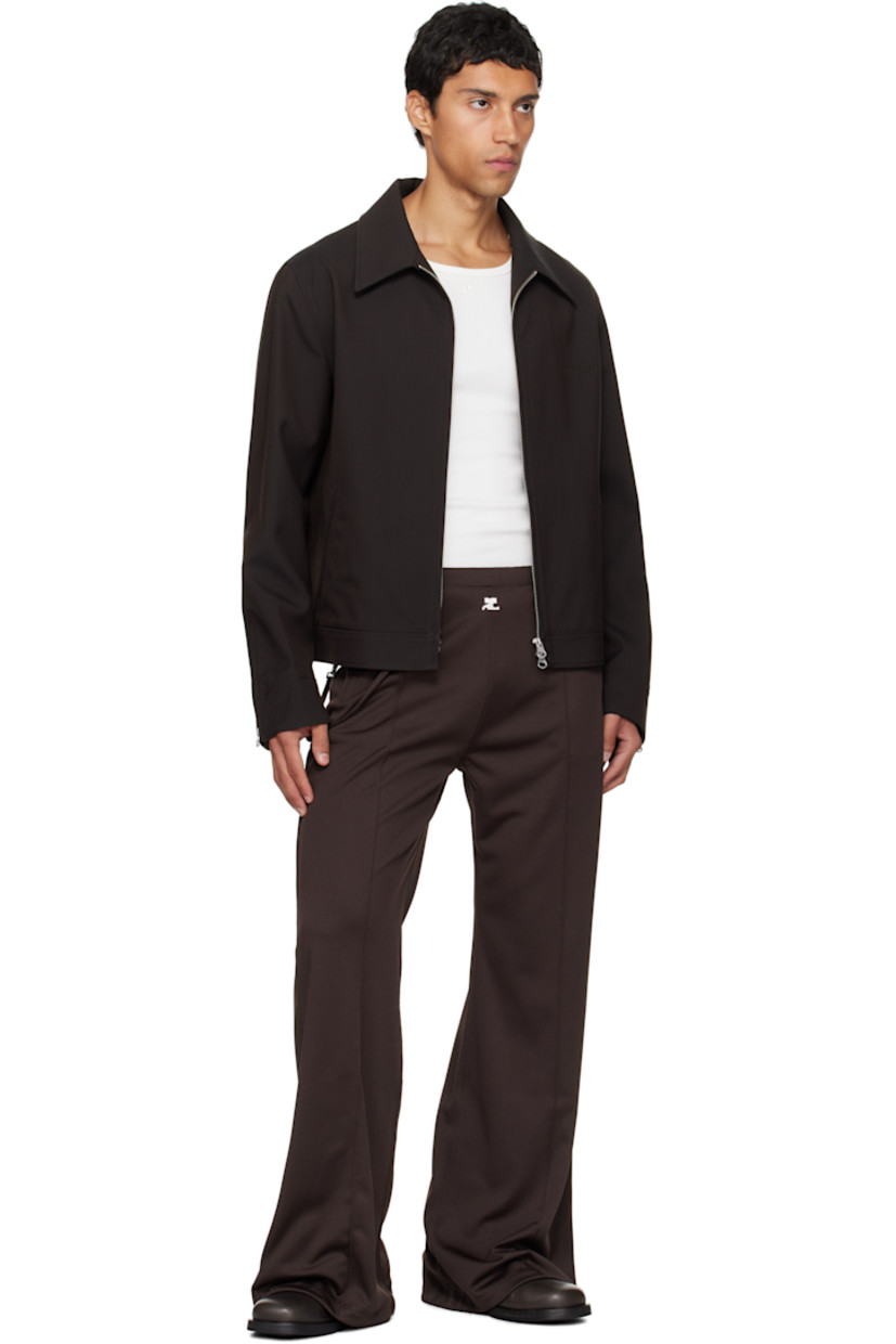Stretch nylon- and wool-blend twill jacket.

· Spread collar
· Two-way zip closure
· Embroidered logo at chest
· Welt pockets at waist
· Zip vent at cuffs
· Adjustable button tabs at back hem
· Welt pocket at interior
· Full satin lining

Supplier color: Chocolate