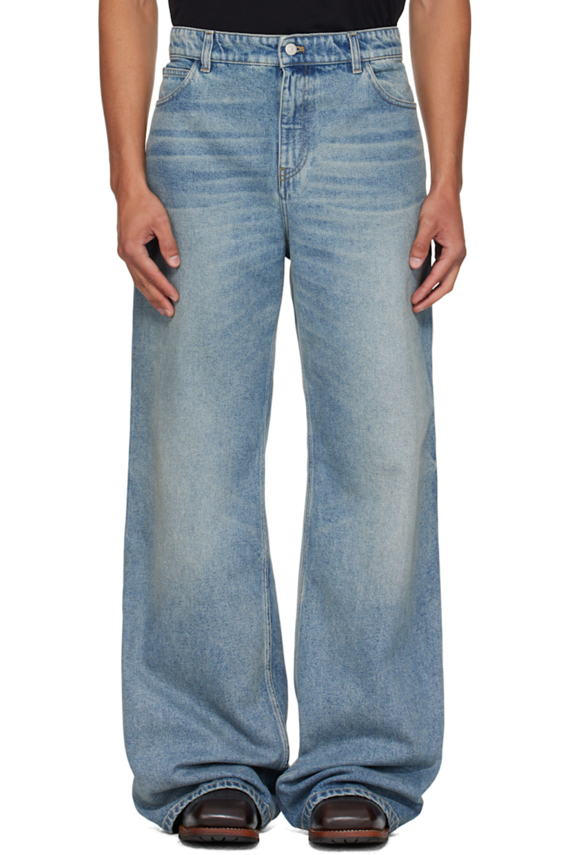 Non-stretch denim jeans.

· Fading and whiskering throughout
· Loose-fit
· Belt loops
· Five-pocket styling
· Zip fly
· Logo patch at coin pocket
· Logo embroidered at back pocket
· Hammer loop and welt pocket at back leg
· Contrast stitching in tan

Supplier color: Vintage medium blue