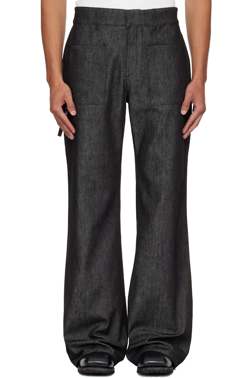 Stretch denim jeans.

· Belt loops
· Four-pocket styling
· Zip fly
· Detachable strap at front and back pocket
· Embroidered logo at back pocket

Supplier color: Black