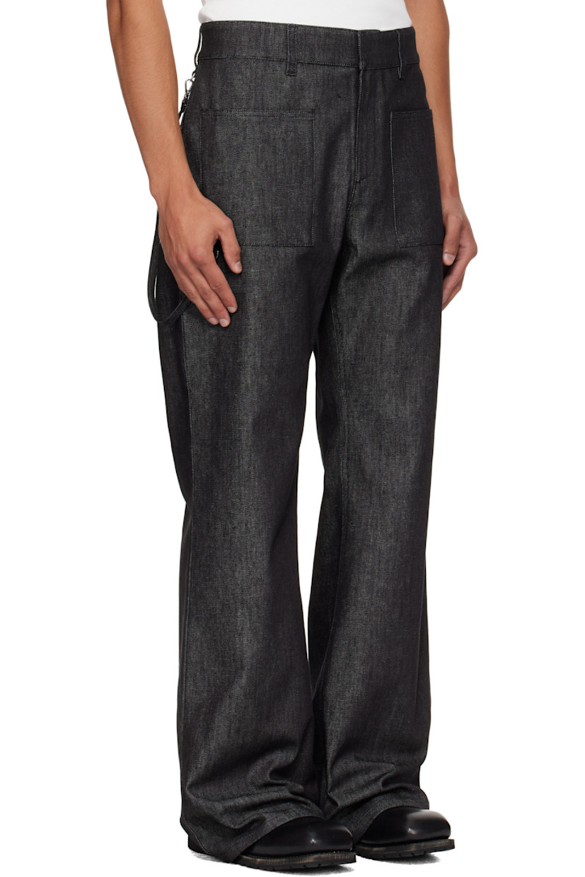 Stretch denim jeans.

· Belt loops
· Four-pocket styling
· Zip fly
· Detachable strap at front and back pocket
· Embroidered logo at back pocket

Supplier color: Black