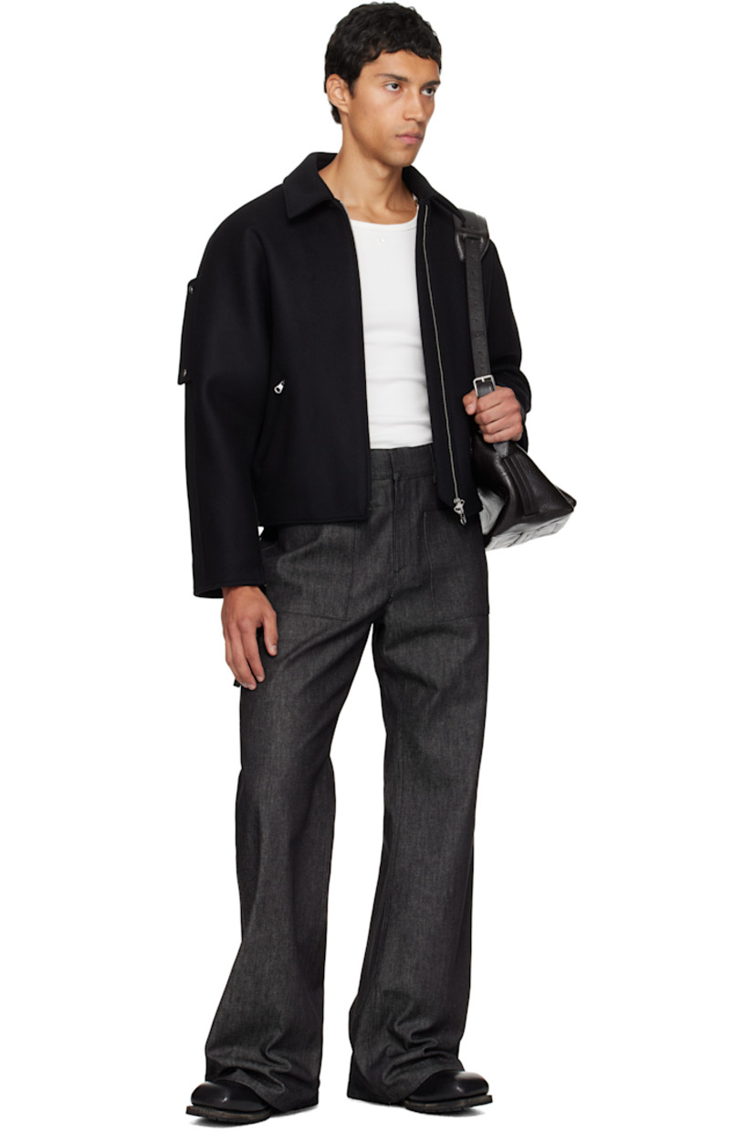 Stretch denim jeans.

· Belt loops
· Four-pocket styling
· Zip fly
· Detachable strap at front and back pocket
· Embroidered logo at back pocket

Supplier color: Black