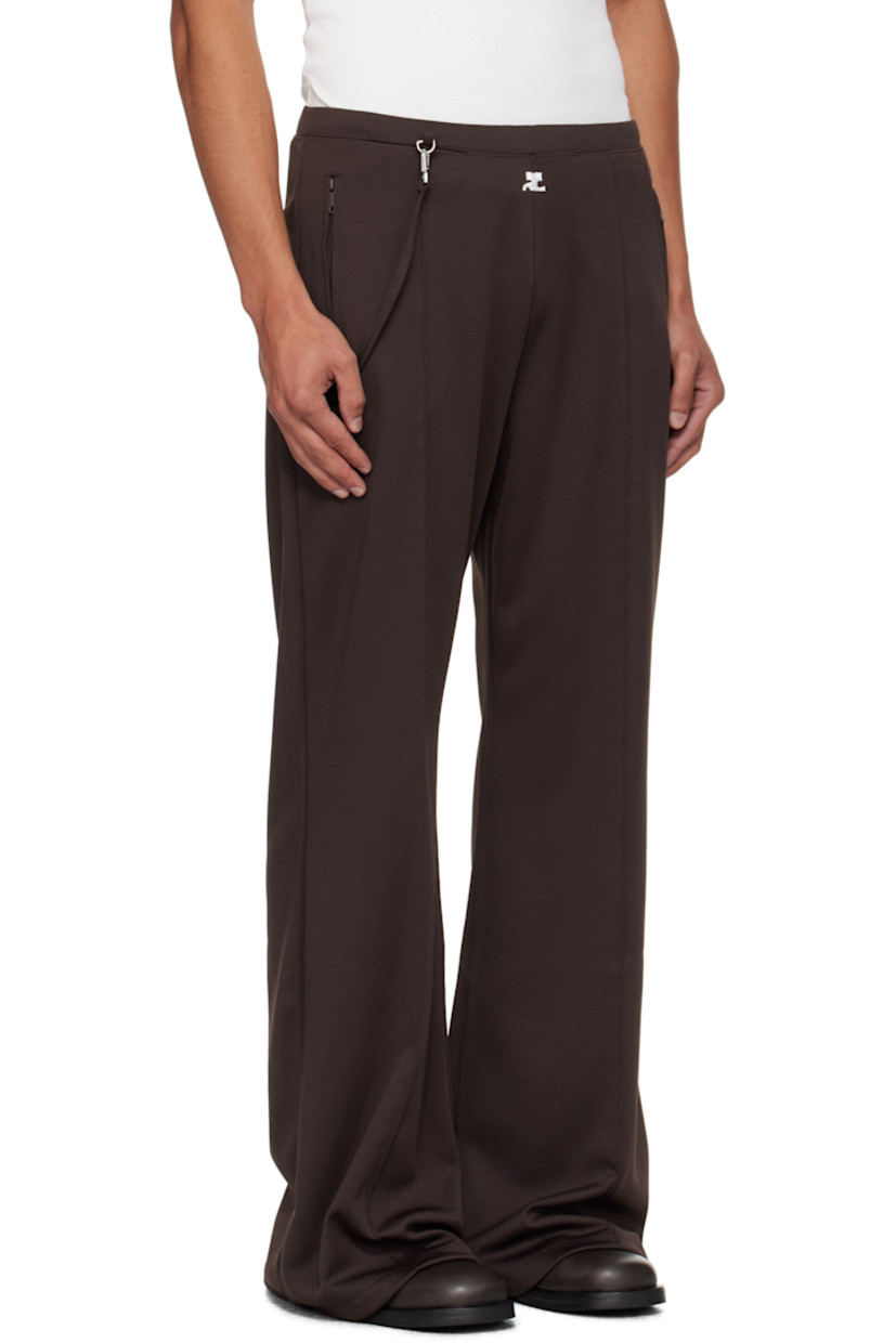 Flared interlock jersey track pants.

· Concealed drawstring at elasticized waistband
· Three-pocket styling
· Embroidered logo patch at front
· Detachable strap at front waist and back pocket
· Pinched seams at legs

Supplier color: Chocolate