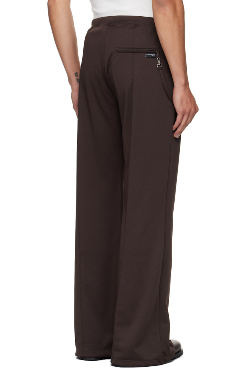 Flared interlock jersey track pants.

· Concealed drawstring at elasticized waistband
· Three-pocket styling
· Embroidered logo patch at front
· Detachable strap at front waist and back pocket
· Pinched seams at legs

Supplier color: Chocolate