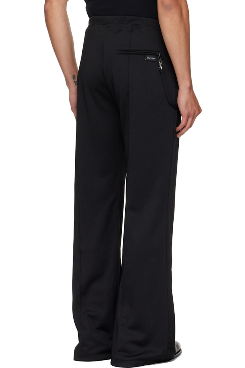 Flared interlock jersey track pants.

· Concealed drawstring at elasticized waistband
· Three-pocket styling
· Embroidered logo patch at front
· Detachable strap at front waist and back pocket
· Pinched seams at legs

Supplier color: Black