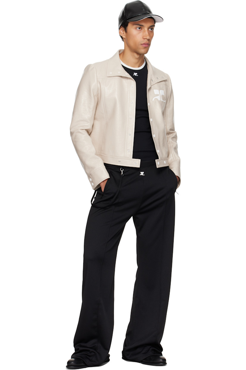 Flared interlock jersey track pants.

· Concealed drawstring at elasticized waistband
· Three-pocket styling
· Embroidered logo patch at front
· Detachable strap at front waist and back pocket
· Pinched seams at legs

Supplier color: Black