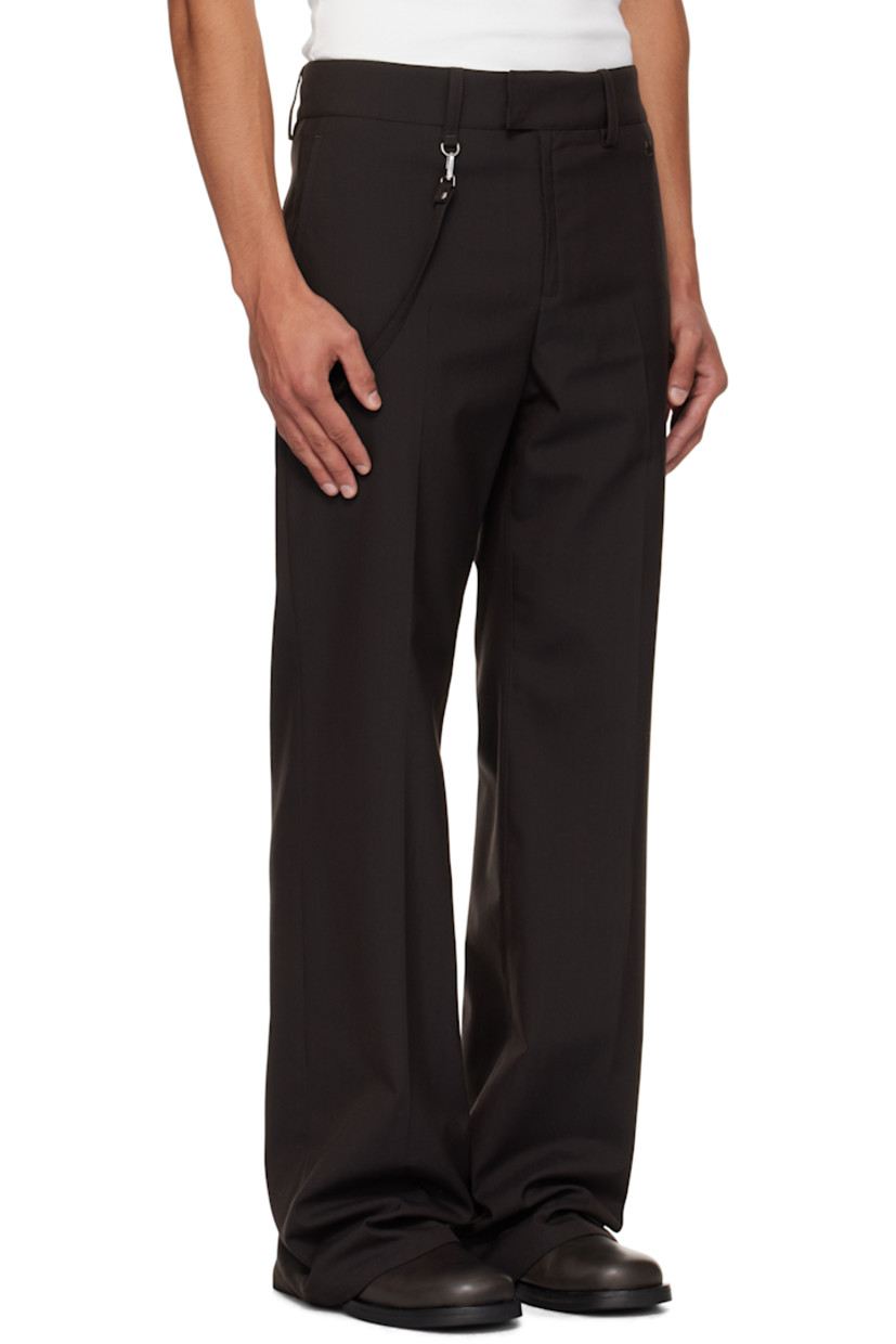 Stretch nylon- and wool-blend twill trousers.

· Flared
· Belt loops
· Three-pocket styling
· Zip fly
· Embroidered logo at front
· Detachable strap at front waist and back pocket
· Creased legs

Supplier color: Chocolate
