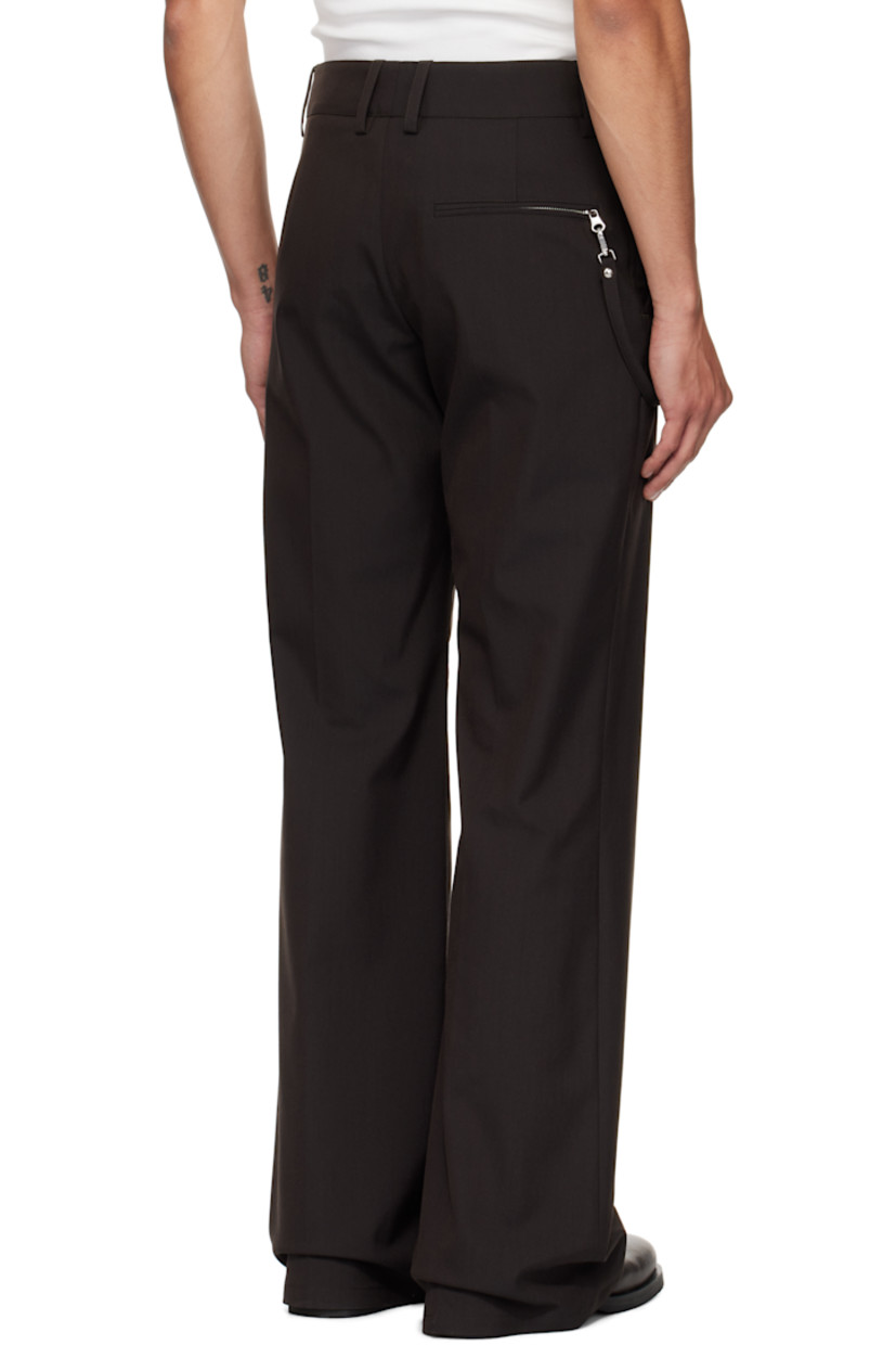 Stretch nylon- and wool-blend twill trousers.

· Flared
· Belt loops
· Three-pocket styling
· Zip fly
· Embroidered logo at front
· Detachable strap at front waist and back pocket
· Creased legs

Supplier color: Chocolate