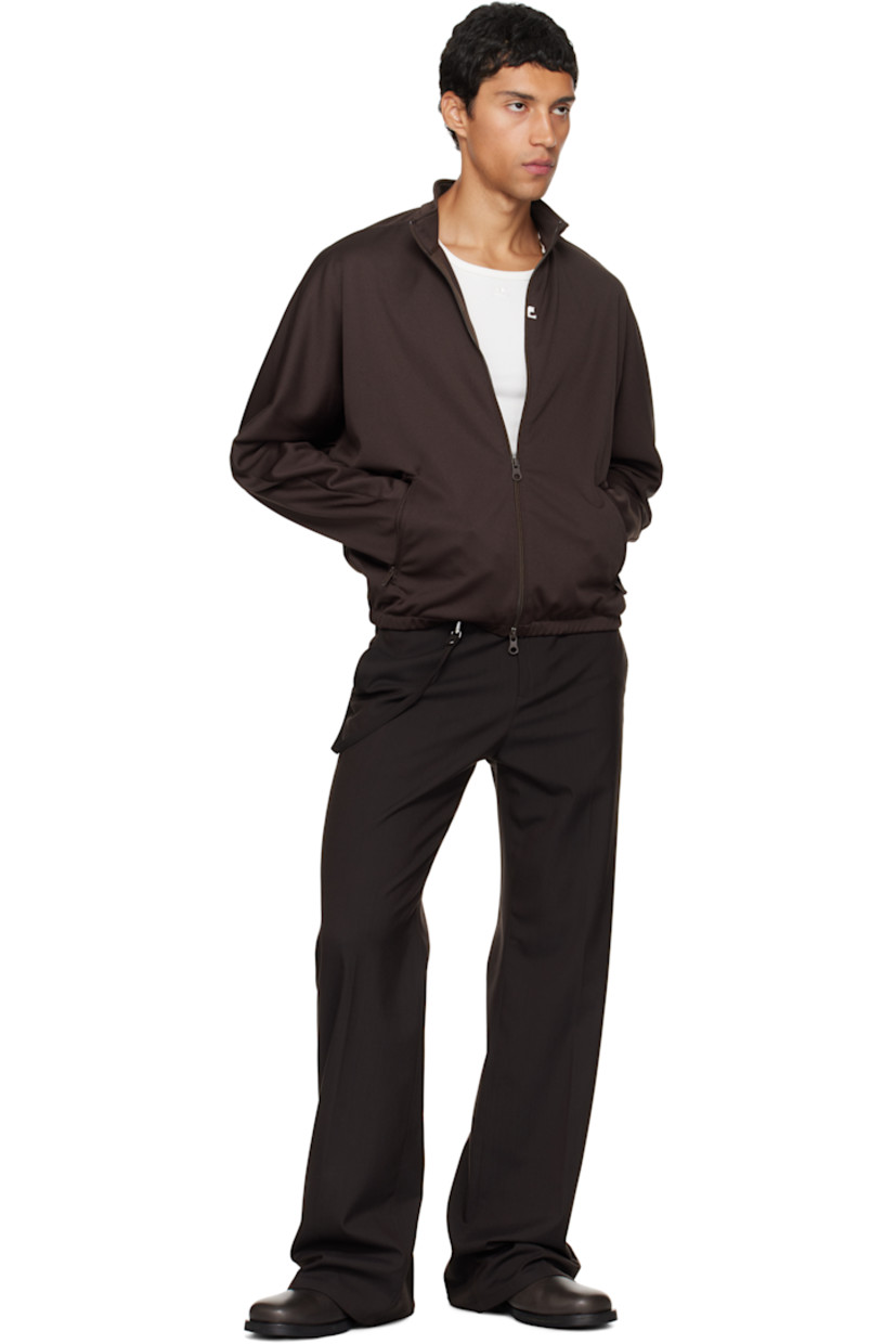 Stretch nylon- and wool-blend twill trousers.

· Flared
· Belt loops
· Three-pocket styling
· Zip fly
· Embroidered logo at front
· Detachable strap at front waist and back pocket
· Creased legs

Supplier color: Chocolate