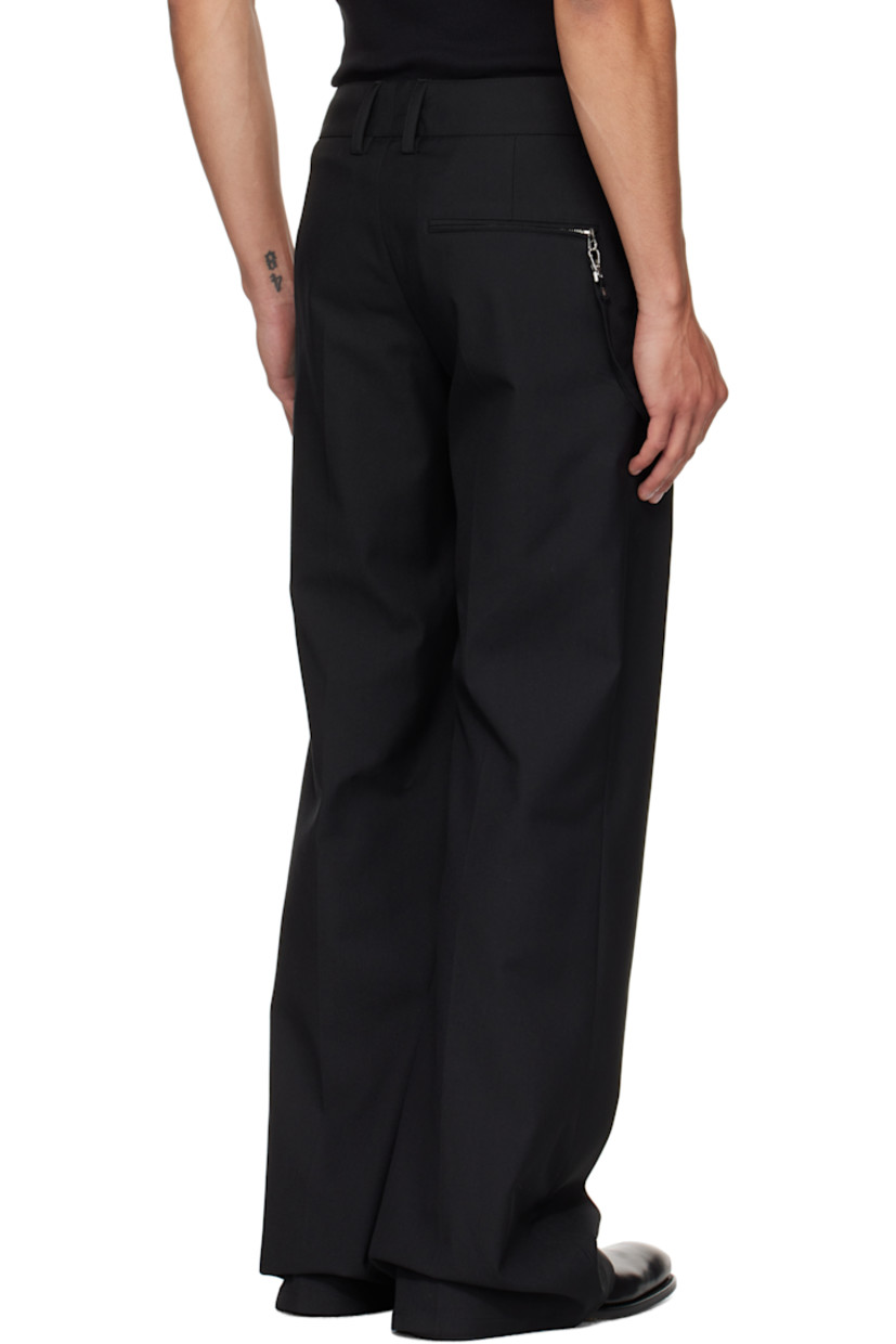 Stretch nylon- and wool-blend twill trousers.

· Flared
· Belt loops
· Three-pocket styling
· Zip fly
· Embroidered logo at front
· Detachable strap at front waist and back pocket
· Creased legs

Supplier color: Black