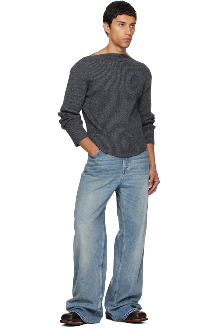 Rib-knit extrafine merino wool sweater.

· Boatneck
· Logo embroidered at chest
· Round hem
· Dropped shoulders

Supplier color: Black/Grey