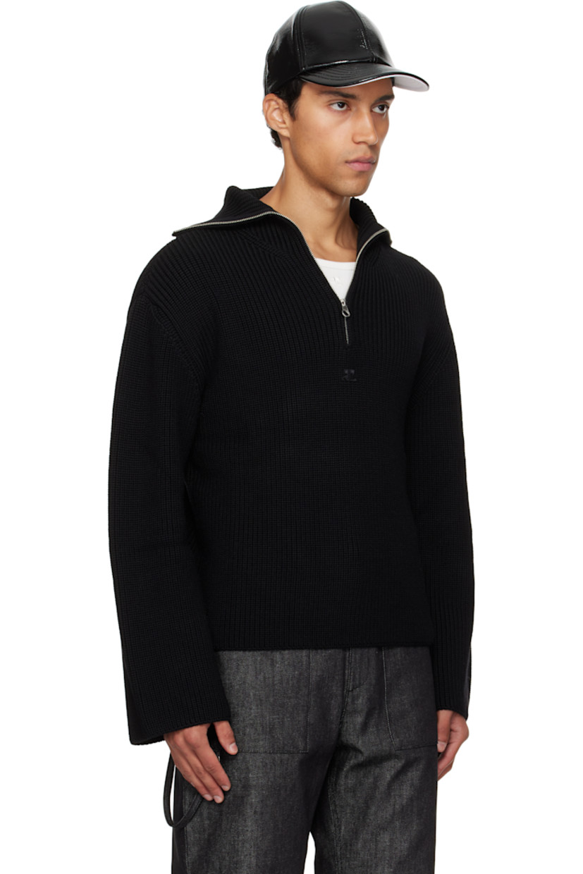 Rib-knit merino wool sweater.

· Funnel neck
· Half-zip closure
· Logo embroidered at chest
· Dropped shoulders

Supplier color: Black