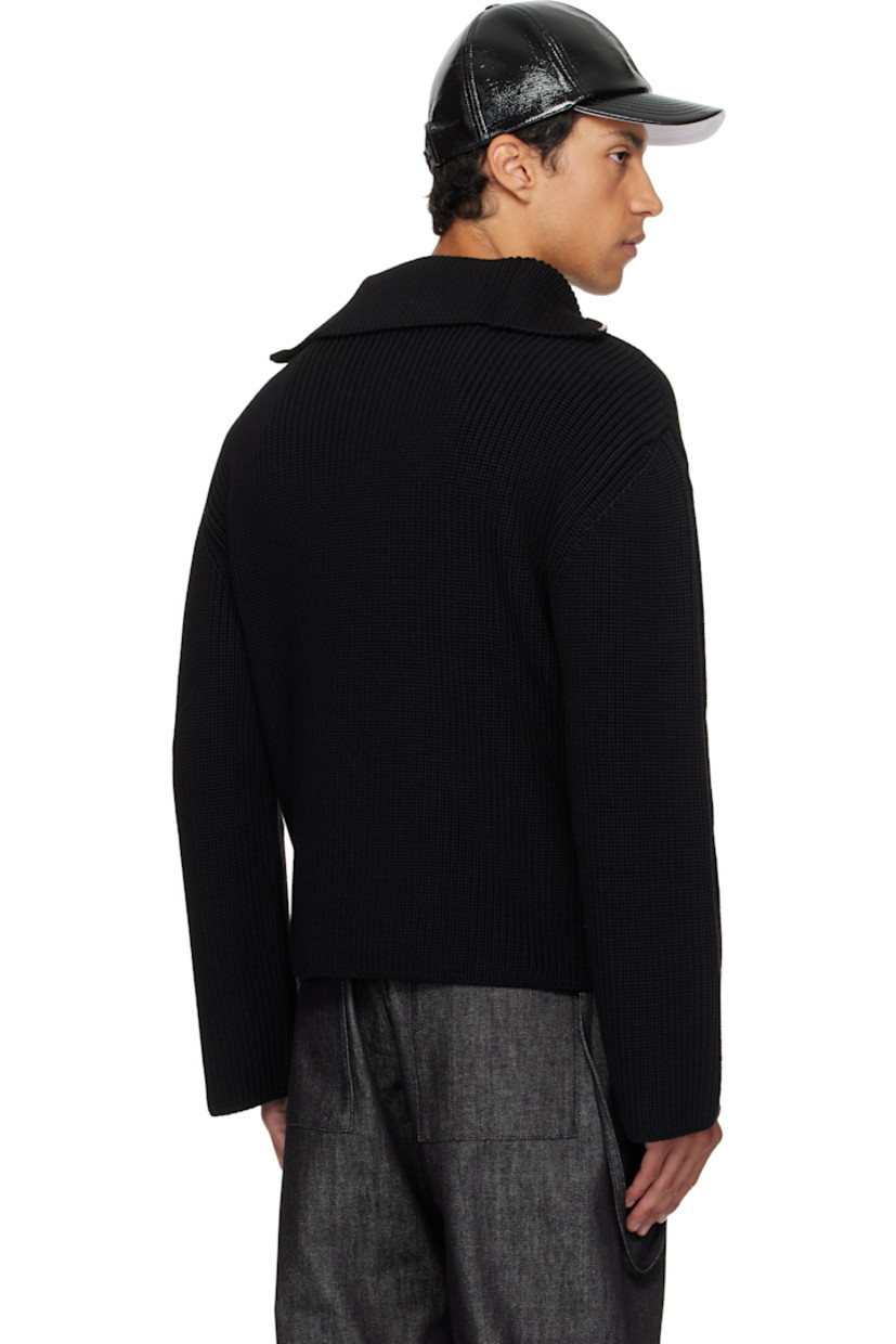 Rib-knit merino wool sweater.

· Funnel neck
· Half-zip closure
· Logo embroidered at chest
· Dropped shoulders

Supplier color: Black