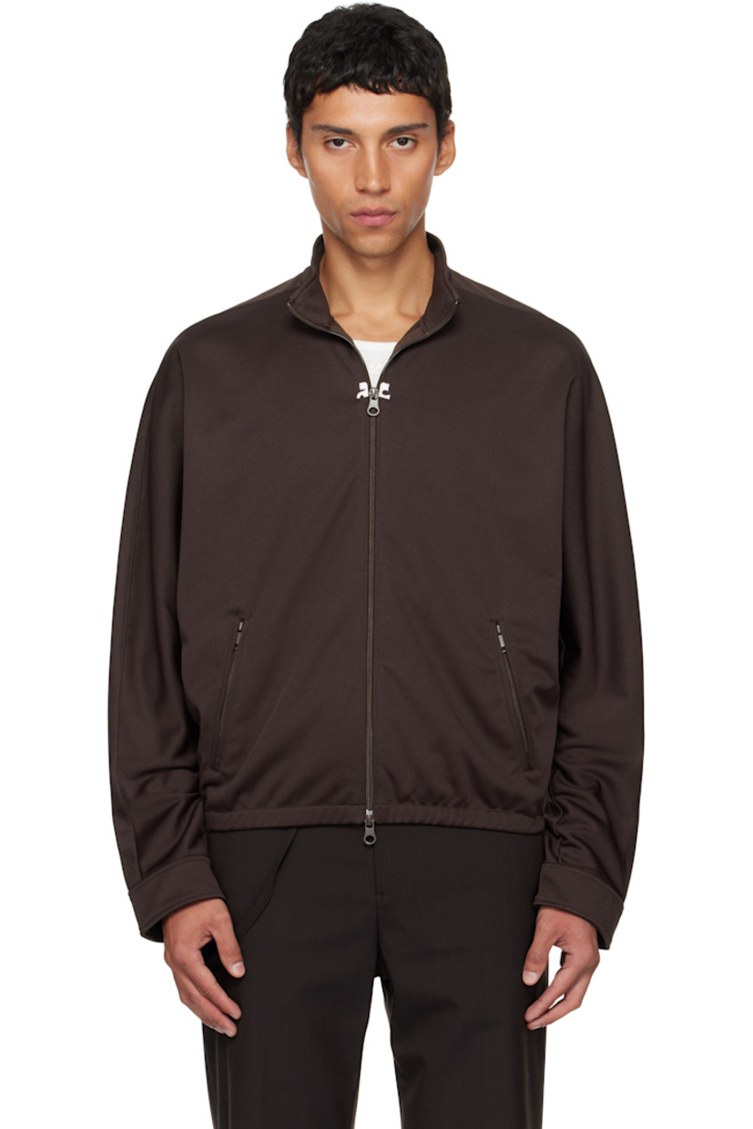 Interlock jersey track jacket.

· Stand collar
· Two-way zip closure
· Embroidered logo patches at chest
· Zip pockets at waist
· Elasticized hem
· Logo flag at side seam
· Dolman sleeves

Supplier color: Chocolate