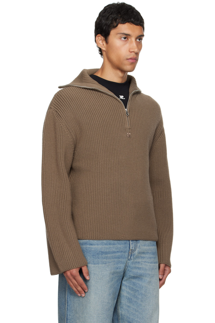 Rib-knit merino wool sweater.

· Funnel neck
· Half-zip closure
· Logo embroidered at chest
· Dropped shoulders

Supplier color: Mocha
