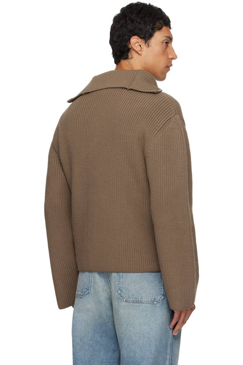 Rib-knit merino wool sweater.

· Funnel neck
· Half-zip closure
· Logo embroidered at chest
· Dropped shoulders

Supplier color: Mocha