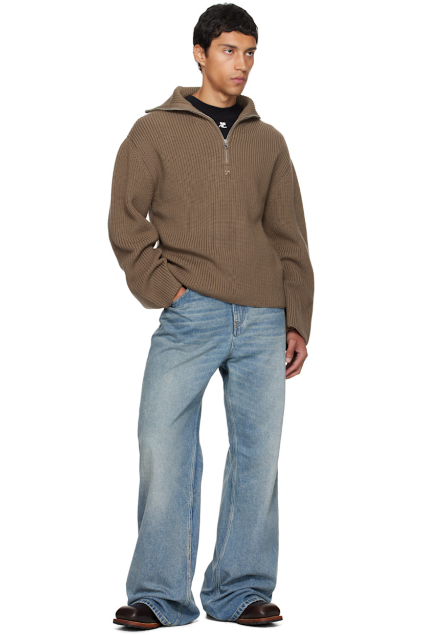 Rib-knit merino wool sweater.

· Funnel neck
· Half-zip closure
· Logo embroidered at chest
· Dropped shoulders

Supplier color: Mocha