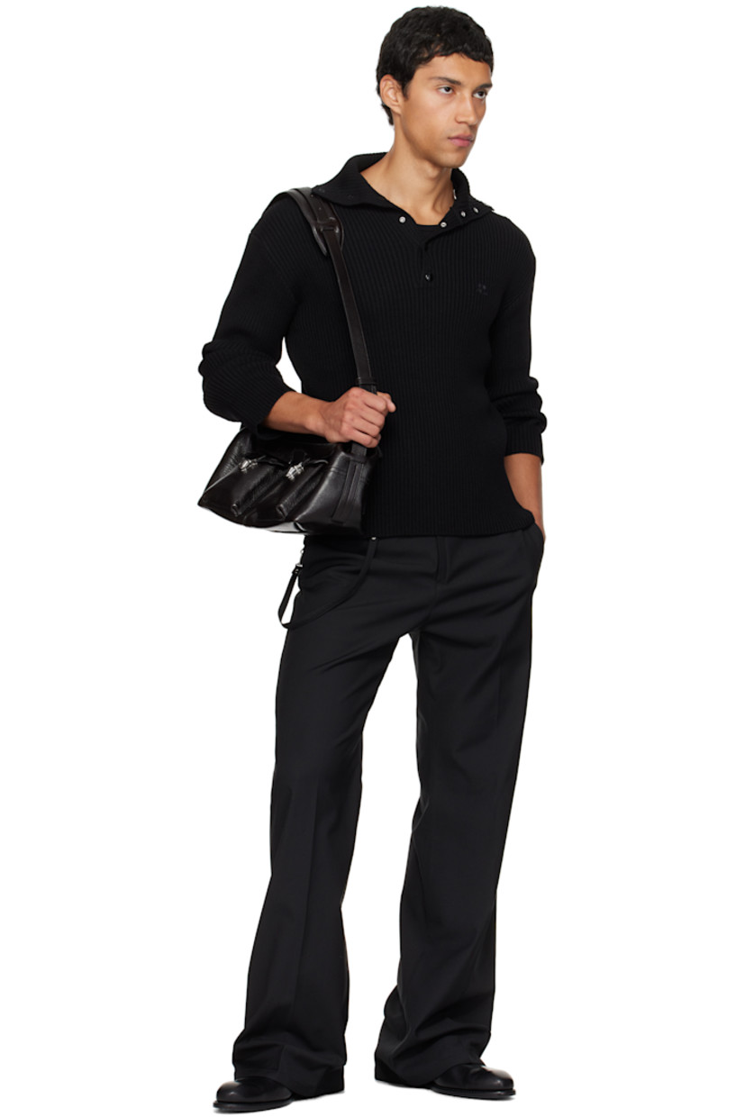 Rib-knit extrafine merino wool polo.

· Spread collar
· Press-stud placket
· Embroidered logo patch at chest
· Dropped shoulders

Supplier color: Black