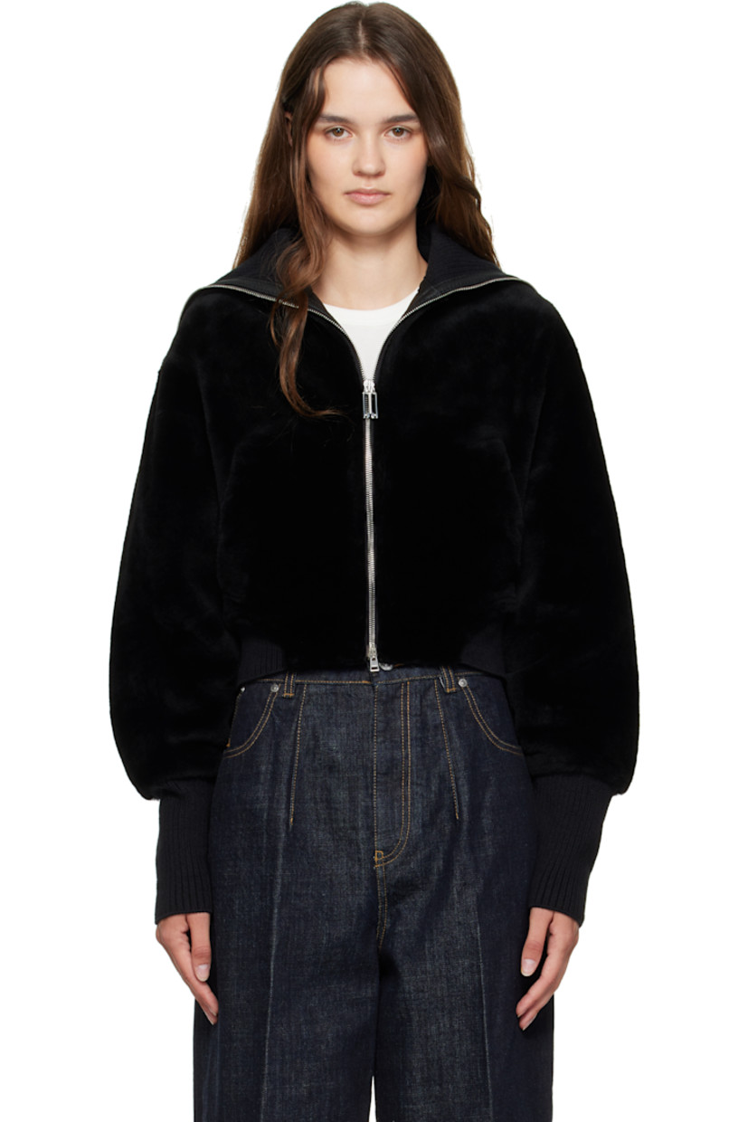 Shearling bomber jacket. 

· Rib-knit foldover collar, hem, and cuffs 
· Two-way zip closure
· Welt pockets at waist 
· Grained lambskin lining

Supplier color: Black